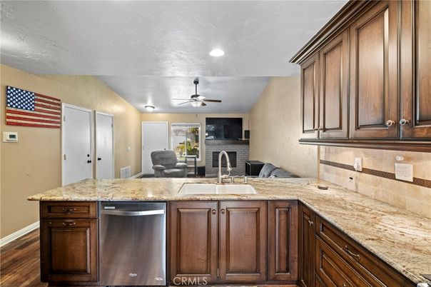 Dining room, Fireplace, Interior, Kitchen, Recessed Lighting, Wood Texture Flooring
