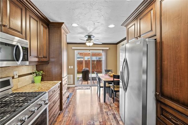 Dining room, Interior, Kitchen, Recessed Lighting, Stainless Steel Appliances, Wood Texture Flooring