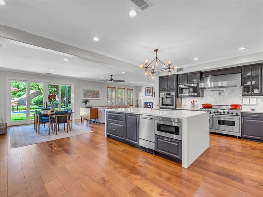 Dining room, Interior, Kitchen, Pendant Lights, Recessed Lighting, Stainless Steel Appliances, Wood Texture Flooring