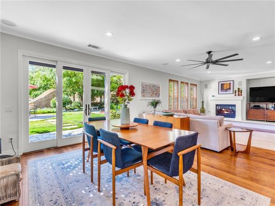 Dining room, Fireplace, Interior, Living room, Recessed Lighting, Wood Texture Flooring