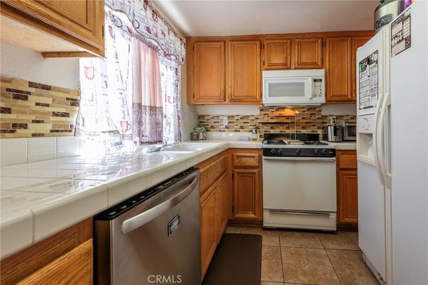 Interior, Kitchen, Stainless Steel Appliances, Tile Countertops