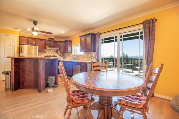 Dining room, Interior, Kitchen, Recessed Lighting, Stainless Steel Appliances, Wood Texture Flooring