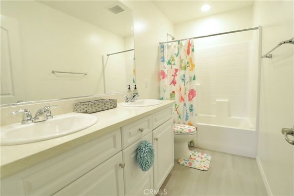 Bathroom, Dual Sink Vanities, Interior, Recessed Lighting, Wood Texture Flooring