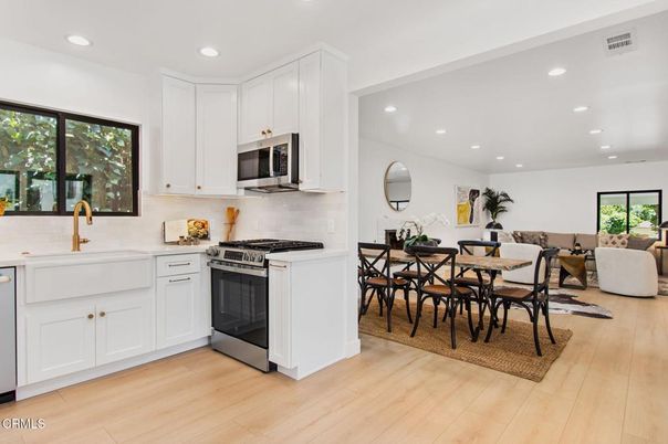 Dining room, Interior, Kitchen, Living room, Recessed Lighting, Stainless Steel Appliances, Wood Texture Flooring