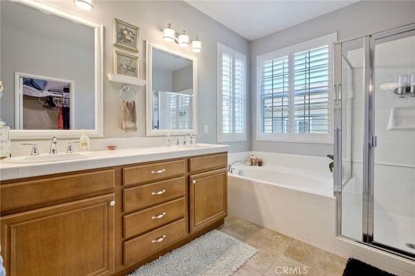 Bathroom, Dual Sink Vanities, Glass Shower, Interior, Recessed Lighting, Tile Countertops
