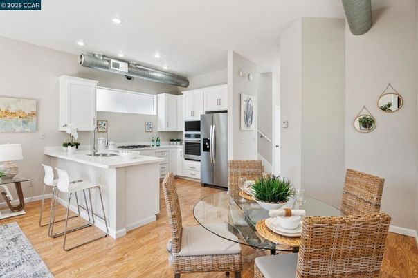 Dining room, Interior, Kitchen, Recessed Lighting, Stainless Steel Appliances, Wood Texture Flooring
