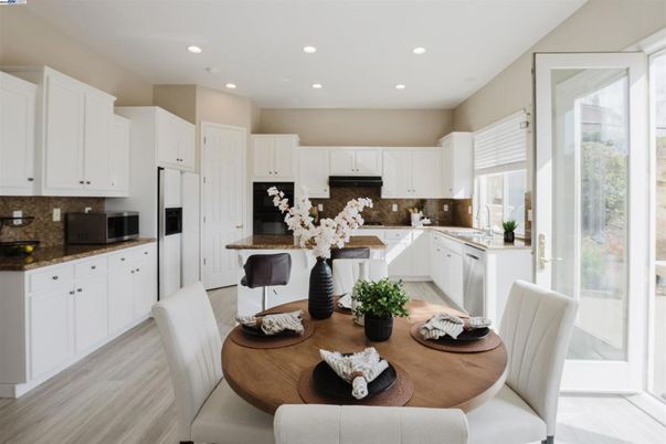 Dining room, Interior, Kitchen, Recessed Lighting, Stainless Steel Appliances, Wood Texture Flooring
