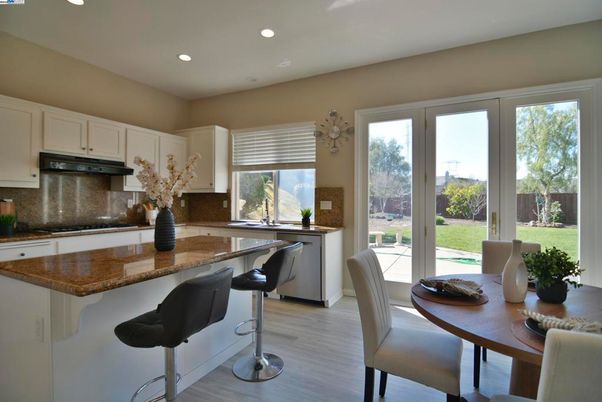Dining room, Interior, Kitchen, Recessed Lighting, Stainless Steel Appliances, Wood Texture Flooring
