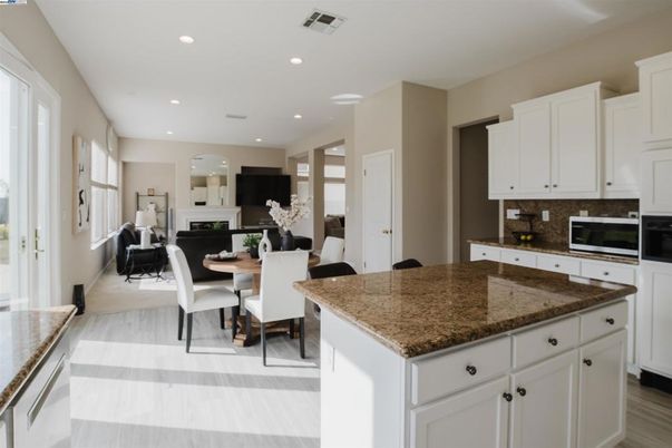 Dining room, Interior, Kitchen, Recessed Lighting, Stainless Steel Appliances, Wood Texture Flooring