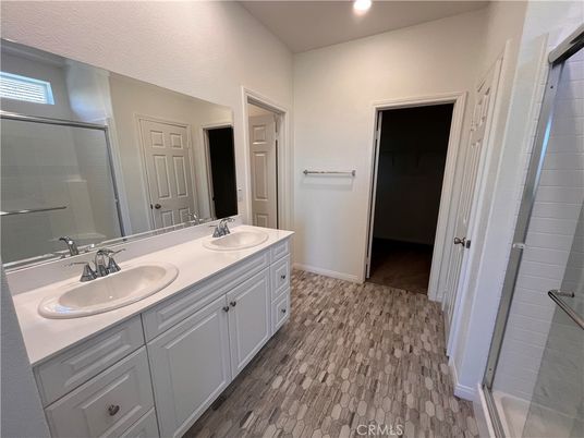 Bathroom, Dual Sink Vanities, Glass Shower, Interior, Recessed Lighting, Wood Texture Flooring