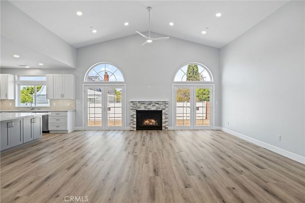 Empty room, Fireplace, Interior, Kitchen, Recessed Lighting, Wood Texture Flooring