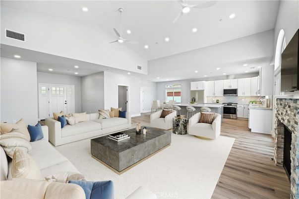 Fireplace, Interior, Kitchen, Living room, Recessed Lighting, Stainless Steel Appliances, Wood Texture Flooring