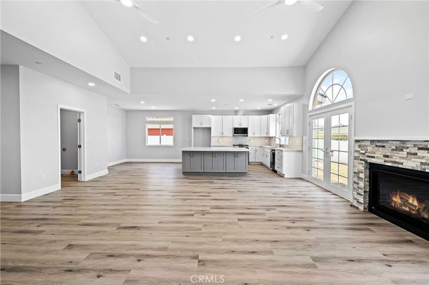 Fireplace, Interior, Kitchen, Recessed Lighting, Wood Texture Flooring