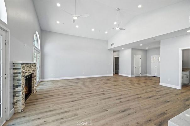 Empty room, Fireplace, Interior, Recessed Lighting, Wood Texture Flooring