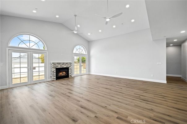 Empty room, Fireplace, Interior, Recessed Lighting, Wood Texture Flooring