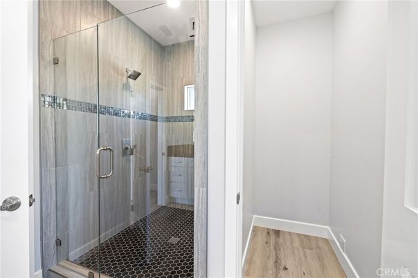 Bathroom, Glass Shower, Interior, Recessed Lighting, Wood Texture Flooring