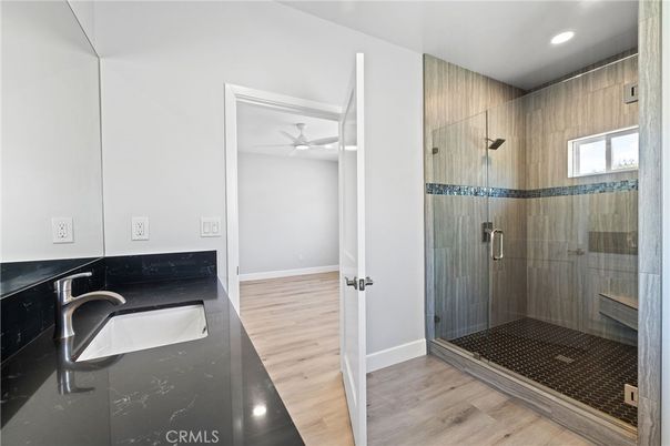 Bathroom, Glass Shower, Interior, Recessed Lighting, Wood Texture Flooring