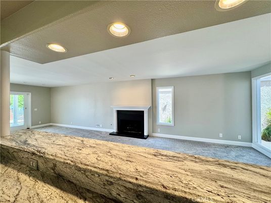 Empty room, Fireplace, Interior, Recessed Lighting, Wood Texture Flooring