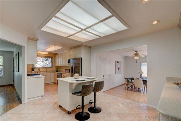 Dining room, Interior, Kitchen, Recessed Lighting, Stainless Steel Appliances, Wood Texture Flooring