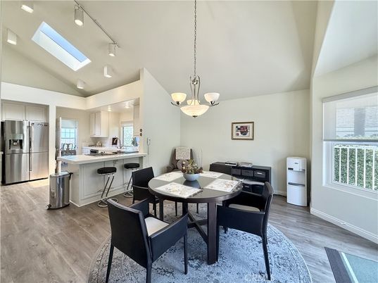 Dining room, Interior, Kitchen, Pendant Lights, Stainless Steel Appliances, Wood Texture Flooring