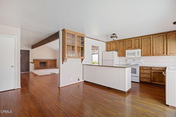 Fireplace, Interior, Kitchen, Tile Countertops, Wooden Beams, Wood Texture Flooring