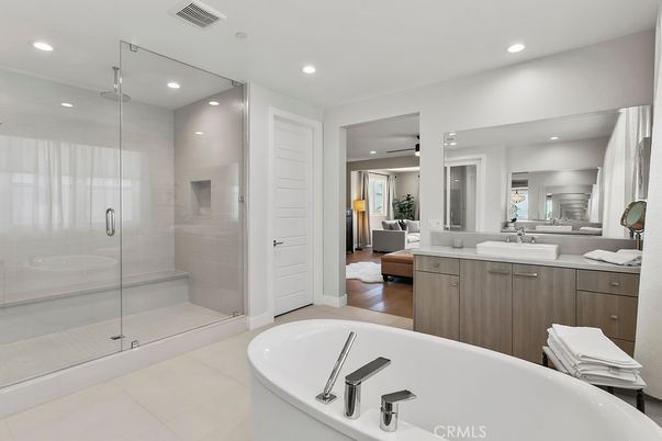 Bathroom, Dual Sink Vanities, Free Standing Baths, Glass Shower, Interior, Living room, Recessed Lighting, Wood Texture Flooring