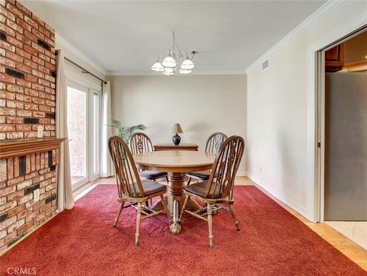 Chandelier, Dining room, Fireplace, Interior, Stone Walls
