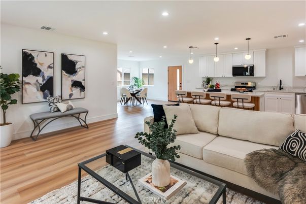 Dining room, Interior, Kitchen, Living room, Pendant Lights, Recessed Lighting, Stainless Steel Appliances, Wood Texture Flooring