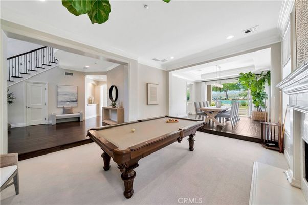 Billiard Table, Dining room, Fireplace, Game Room, Interior, Recessed Lighting, Wood Texture Flooring