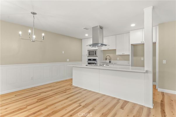 Chandelier, Interior, Kitchen, Recessed Lighting, Stainless Steel Appliances, Wood Texture Flooring