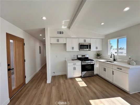 Interior, Kitchen, Recessed Lighting, Stainless Steel Appliances, Wood Texture Flooring