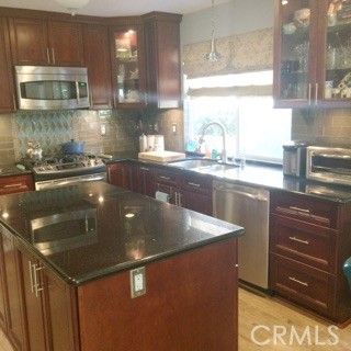 Chandelier, Interior, Kitchen, Pendant Lights, Stainless Steel Appliances, Wood Texture Flooring