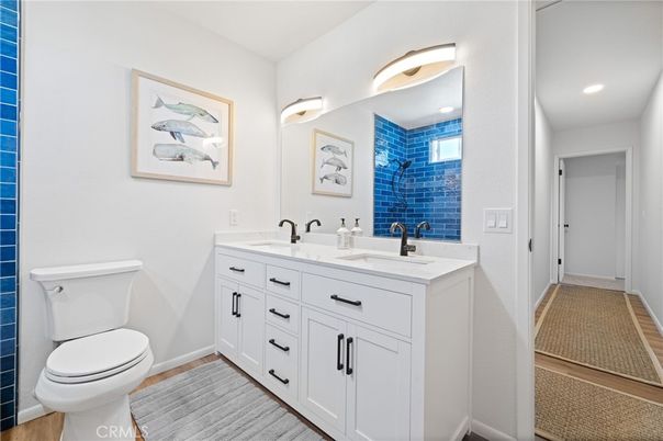 Bathroom, Dual Sink Vanities, Interior, Recessed Lighting, Wood Texture Flooring
