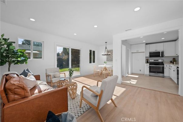 Dining room, Interior, Kitchen, Living room, Pendant Lights, Recessed Lighting, Stainless Steel Appliances, Wood Texture Flooring
