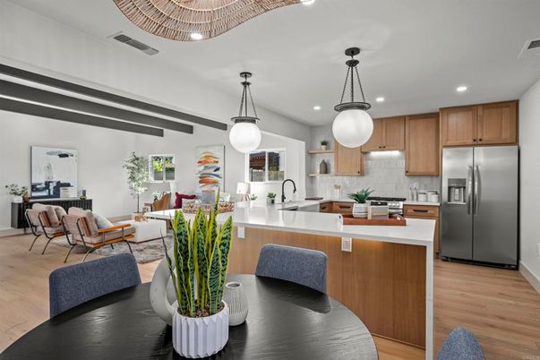 Dining room, Interior, Kitchen, Living room, Pendant Lights, Recessed Lighting, Stainless Steel Appliances, Wood Texture Flooring