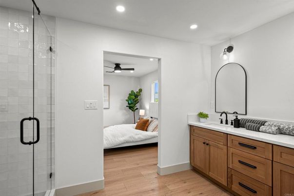 Bathroom, Bedroom, Glass Shower, Interior, Recessed Lighting, Wood Texture Flooring