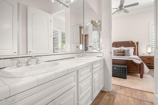 Bathroom, Bedroom, Dual Sink Vanities, Glass Shower, Interior, Tile Countertops, Wood Texture Flooring