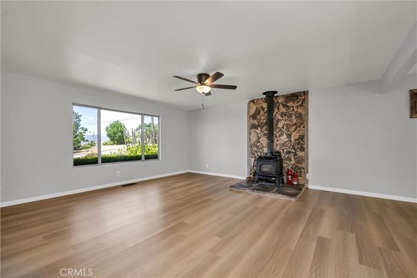 Empty room, Fireplace, Interior, Stone Walls, Wood Texture Flooring