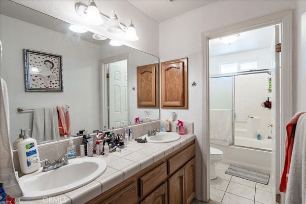 Bathroom, Dual Sink Vanities, Glass Shower, Interior, Tile Countertops