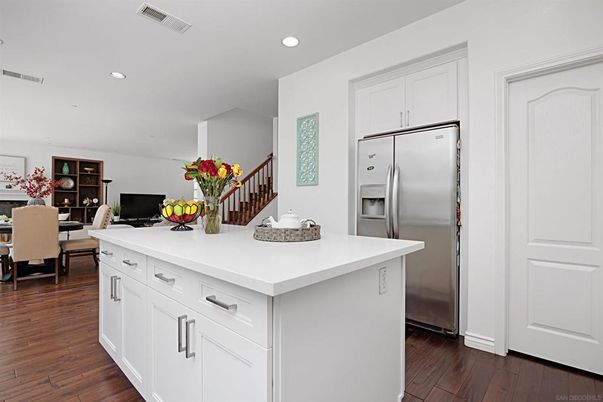 Dining room, Interior, Kitchen, Recessed Lighting, Stainless Steel Appliances, Wood Texture Flooring