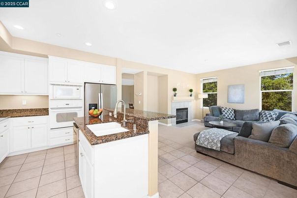 Fireplace, Interior, Kitchen, Living room, Recessed Lighting, Stainless Steel Appliances