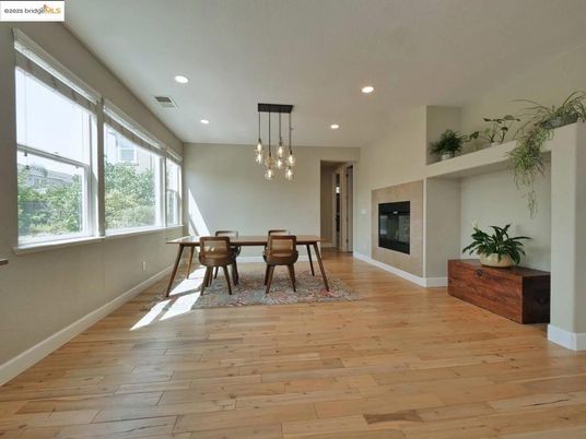 Dining room, Fireplace, Interior, Pendant Lights, Recessed Lighting, Wood Texture Flooring