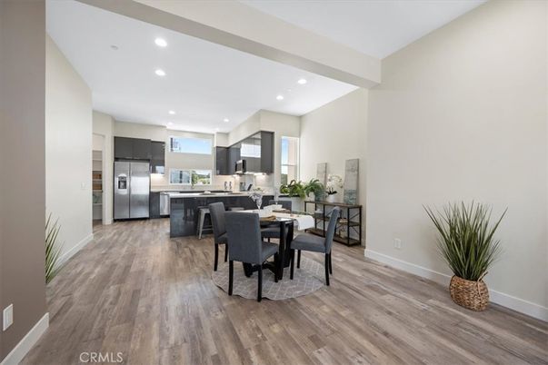 Dining room, Interior, Kitchen, Recessed Lighting, Stainless Steel Appliances, Wood Texture Flooring