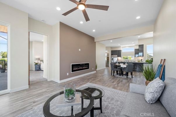 Dining room, Fireplace, Interior, Kitchen, Recessed Lighting, Wood Texture Flooring