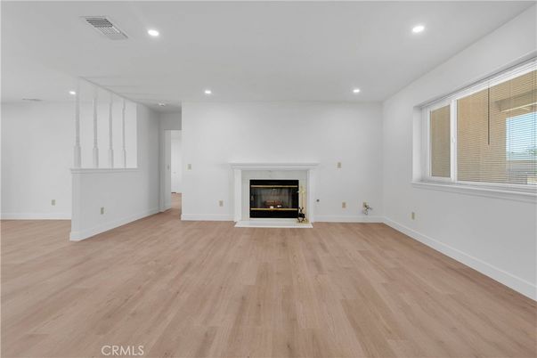 Empty room, Fireplace, Interior, Recessed Lighting, Wood Texture Flooring