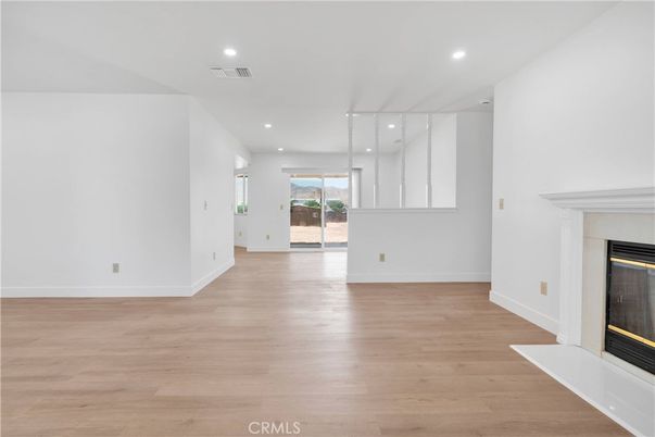 Empty room, Fireplace, Interior, Recessed Lighting, Wood Texture Flooring