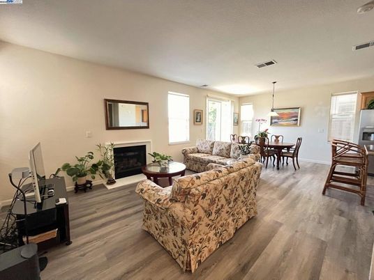 Dining room, Fireplace, Interior, Living room, Pendant Lights, Wood Texture Flooring