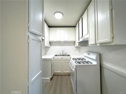 Interior, Kitchen, Tile Countertops, Wood Texture Flooring