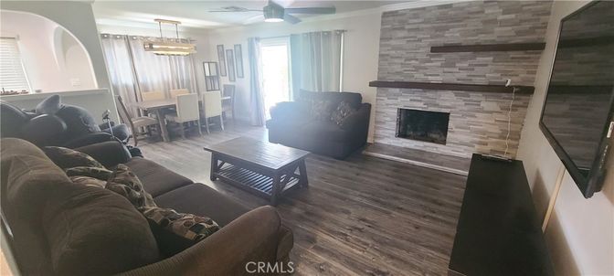 Dining room, Fireplace, Interior, Living room, Pendant Lights, Stone Walls, Wood Texture Flooring