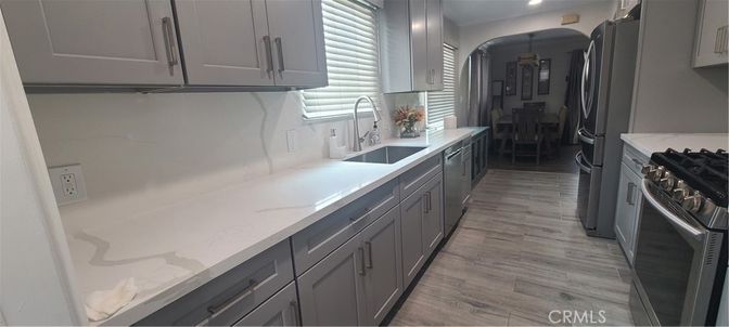 Dining room, Interior, Kitchen, Recessed Lighting, Stainless Steel Appliances, Wood Texture Flooring